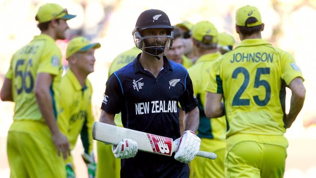 Lone hand: New Zealand's Grant Elliott walks off the field after being dismissed for 83 runs during the Cricket World Cup final against Australia at the Melbourne Cricket Ground.