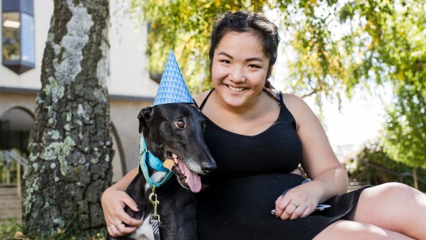 Event organiser and ANU student Lucy Yang with her greyhound Bruno.