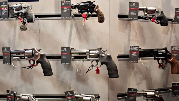 Guns on display in the Smith & Wesson booth at a gun expo in Tennessee in April. 