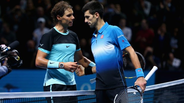 Respectful rivalry: Novak Djokovic shakes hands at the net after his straight-sets victory against Rafael Nadal.