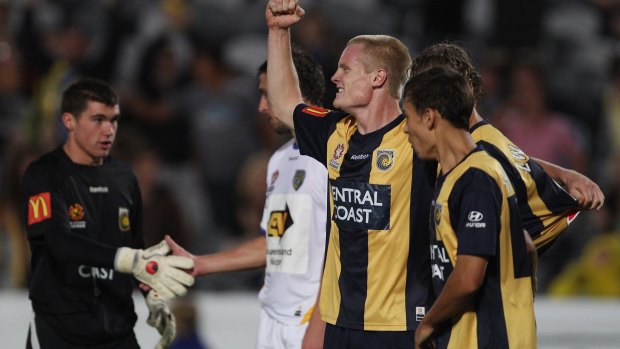 Matt Simon celebrates a victory with the Central Coast Mariners.