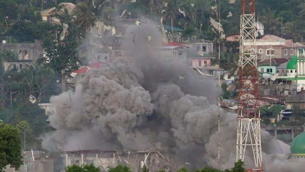 Philippine Air Force fighter jets bomb Marawi city on the southern island of Mindanao in June.