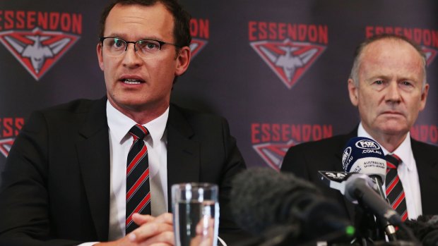 Bombers chief executive Xavier Campbell and chairman Lindsay Tanner face the media after the CAS announcement.
