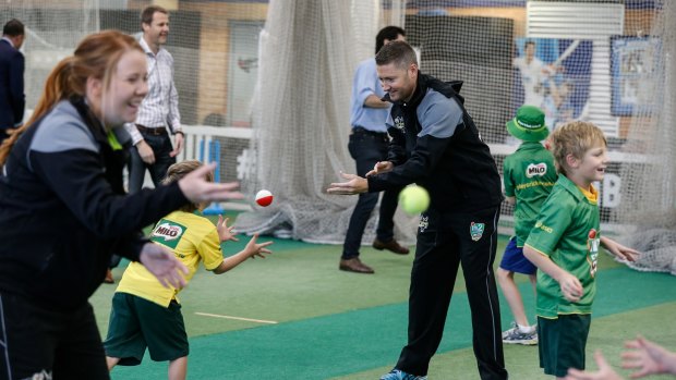 Giving back: Michael Clarke at the SCG on Thursday coaching kids in the finer points of cricket.