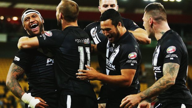 Manu Vatuvei is congratulated after completing his brace.