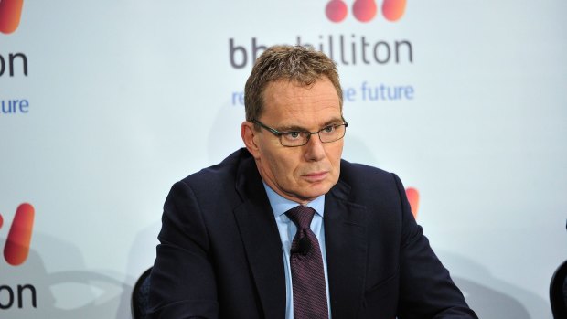 BHP's 52 per cent drop in underlying earnings underscores the challenges chief executive officer Andrew Mackenzie faces as he trims capital spending and debt to try to reassure bond investors and ratings companies.