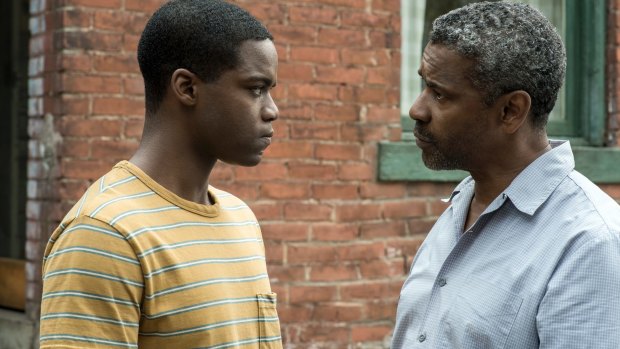 Jovan Adepo, left, and Denzel Washington in a scene from <I>Fences</I>, which began life as a stage play. 