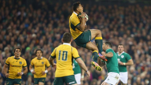 Kept quiet: Israel Folau was rarely in position to take the high ball against Ireland.