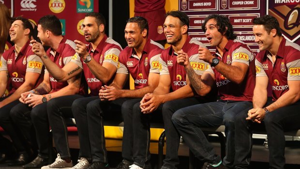 (L-R) Billy Slater, Darrius Boyd, Greg Inglis, Justin Hodges, Will Chambers, Jonathan Thurston and Cooper Cronk share a joke during the Queensland Maroons State of Origin Team Announcement.