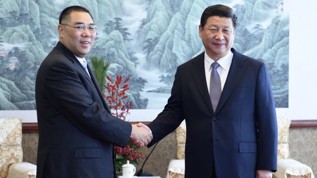 Chinese President Xi Jinping (right) meets Macau chief executive Fernando Chui Sai On in Macau on Friday.