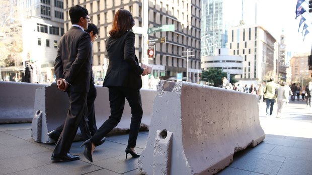 The large concrete blocks installed in Martin Place are expected to be replaced by garden beds or other measures to block traffic.