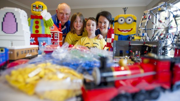 Matthew, James, Thomas and Tamara Dadswell prepare Lego wonders for the upcoming BrickExpo. 
