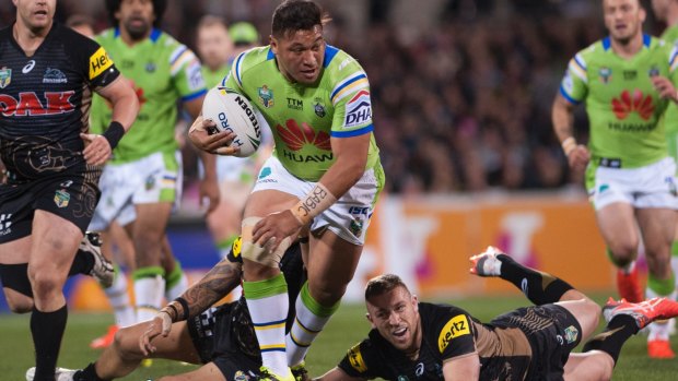 On the charge: Josh Papalii makes a clean break. 