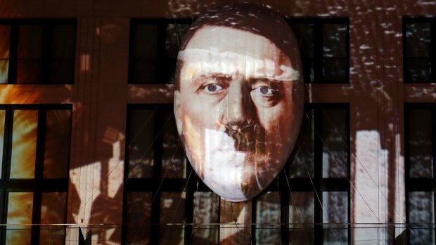 The face of Adolf Hitler is projected onto a 3D canvas as part of an art installation during a rehearsal for the 'Berlin Leuchtet' (Berlin shines) festival in Berlin last month.
