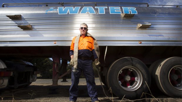 Dave Young fills up his 18,000 litre tanker.