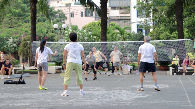A badminton game under way in  Ho Chi Minh City.