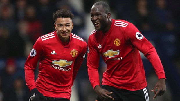 Jesse Lingard and Romelu Lukaku celebrate for Manchester United at West Brom.