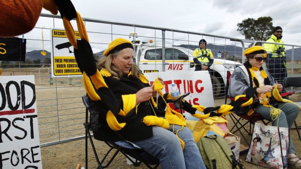 NCH NEWS. Protesters blockaded access to AGL's Waukivory Pilot Project exploratory coal seam gas fracking site on Fairbairn Road, Gloucester. Pic shows Manning Valley residents Kathy Barbour and Jennifer Granger knitting a chain in front of the gates to the site. 16th August 2014.   