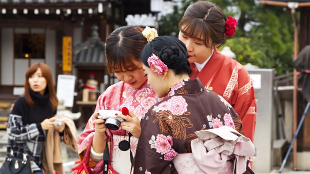 Japanese girls look the part at Kiyomizu temple. 
