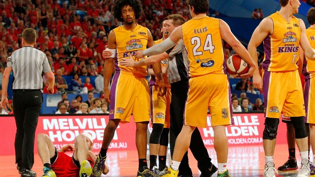 In hot water: Josh Childress is restrained after fouling the Perth Wildcats' off the ball at Perth Arena.