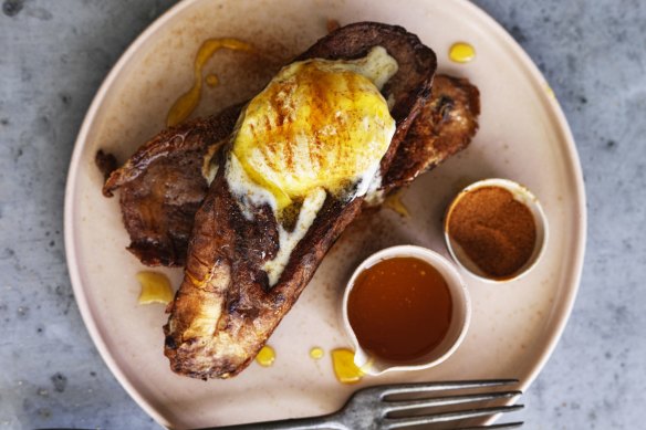 Red wine torrijas wth cinnamon sugar, orange syrup and ice-cream.