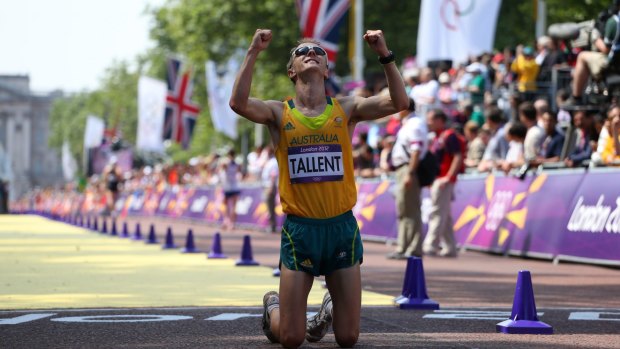 Jared Tallent celebrates after crossing the finish line and claiming silver in the men's 50km walk at the London Olympics in 2012.