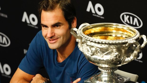 He's been here before: Federer talks to the media after winning the Australian Open on Sunday.