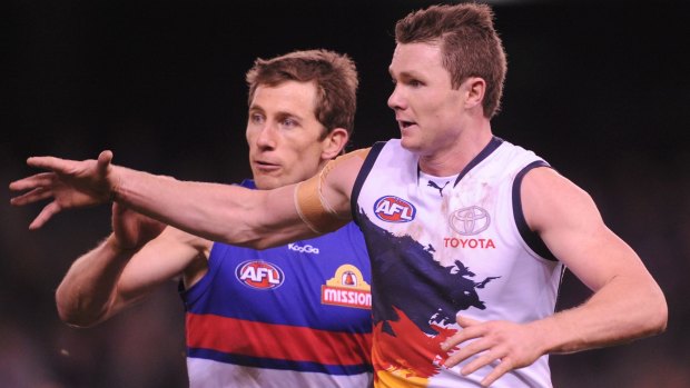 Patrick Dangerfield (right) could play his final game for the Crows against the Dogs.