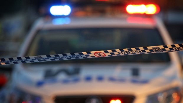 A man armed with a knife has threatened a female postal worker in Kingston at lunch time on Monday.