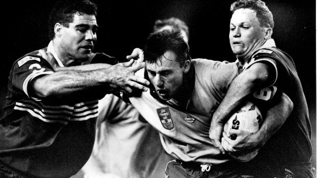 The second state of Origin Match between NSW and Queensland. Blues skipper Laurie Daley throws his body in the firing line. May 17, 1993.