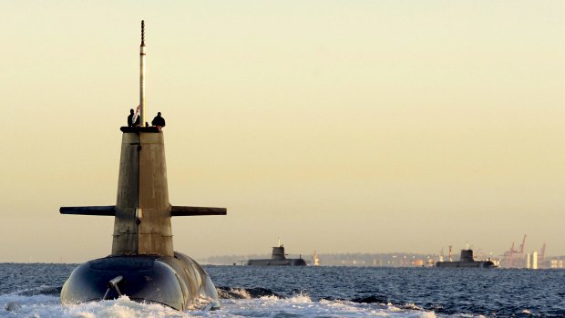The government has stopped short of promising to build the submarine fleet at home.