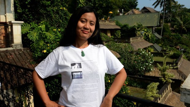 Silenced: Indonesian novelist Eliza Vitri Handayani wears her work in Ubud after a session launching her latest work was cancelled.