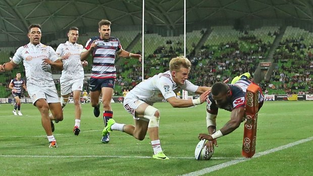 You win some: High-profile Rebels signing Marika Koroibete scores a try.