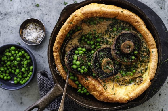 Giant Yorkshire pudding with roasted mushrooms and creamy mushroom sauce.