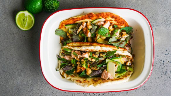 Flatbread piled with flaked hot smoked salmon, coriander dressing, cucumber, herbs and cashews.