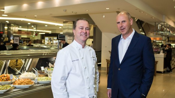 Celebrity chef Neil Perry (left) with David Jones CEO John Dixon: The department store's appetite for Australia's upmarket foodies could hurt Coles and Woolworths, credit agency Moody's warns.