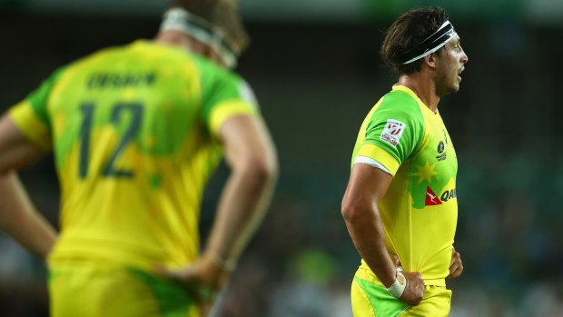 Dramatic draw: Australia's Tom Cusack and Sam Myers looked forlorn figures following their final seconds draw against New Zealand.