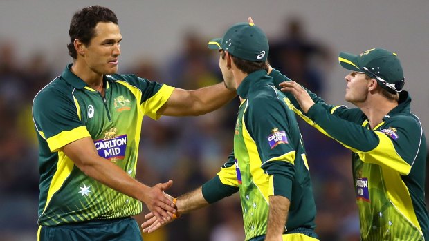 Nathan Coulter-Nile celebrates with Glenn Maxwell and Steve Smith after the dismissal of Dale Steyn.