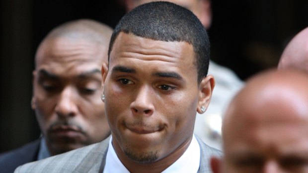 Chris Brown leaves court in 2009 after facing assault charges against former girlfriend Rihanna. 