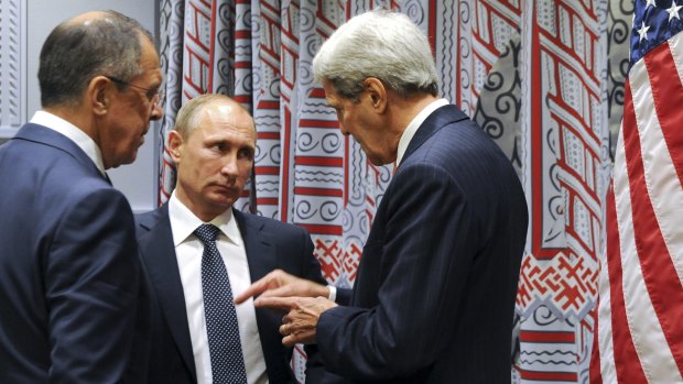 Russian President Vladimir Putin (centre) and Foreign Minister Sergey Lavrov, listen to US Secretary of State John Kerry at the UN earlier this week.