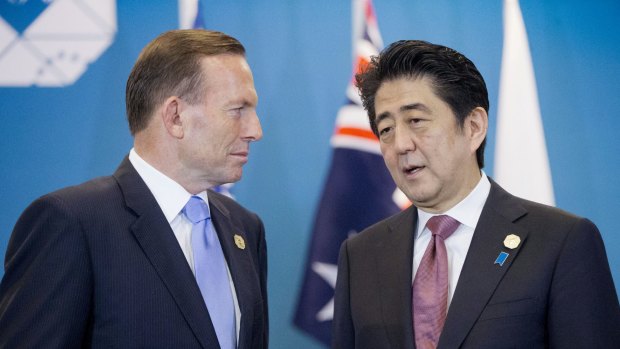 Then Australian prime minister Tony Abbott, left, and Japanese Prime Minister Shinzo Abe in 2014.