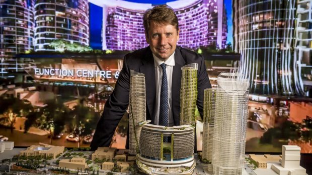 Echo Entertainment chief executive Matthew Bekier with a model of the new Brisbane waterfront casino.