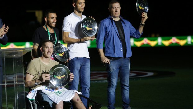 Former Chapecoense players Neto, Follmann, Alan Ruschel and radio announcer Rafael Henzel are honored prior to a friendly between Brazil and Colombia in Rio de Janeiro this week.
