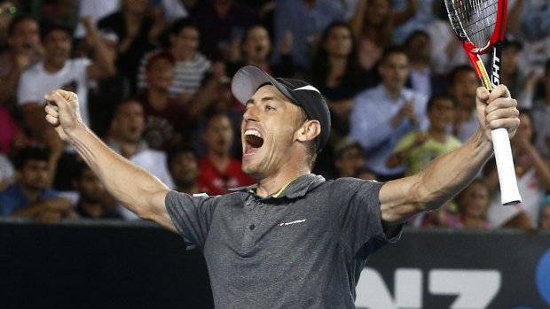 Holding his nerve: John Millman celebrates after defeating Gilles Muller of Luxembourg.
