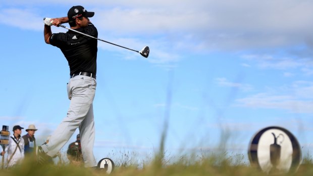 Australian golfer Jason Day tees off on the 15th hole during the third round of the Open at St Andrews on Sunday.