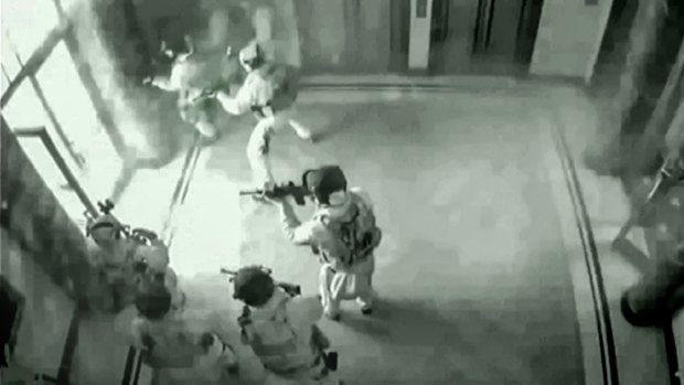 CCTV footage of police entering the Lindt Cafe.