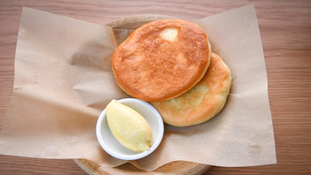 Fluffy griddled flatbreads with smoke-infused butter. 