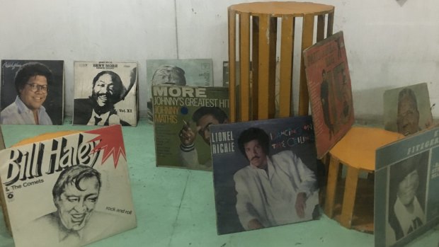 Bill Haley and Lionel Richie on display in a Havana record store.