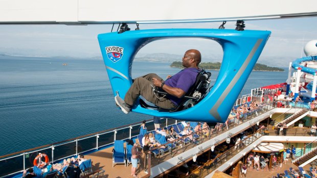 A guest aboard the Carnival Horizon pedals a SkyRide vehicle around much of the 133,500-ton cruise liner.