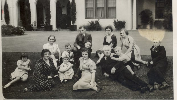 Joe Lyons and his family gathered on the lawn of the Lodge in Canberra, October 6, 1954. 